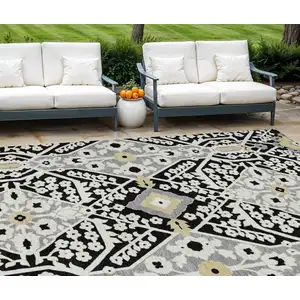 Photo of Black Gray And Gold Floral Washable Indoor Outdoor Area Rug