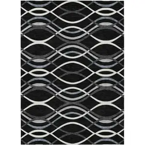 Photo of Black Gray And Ivory Abstract Washable Indoor Outdoor Area Rug