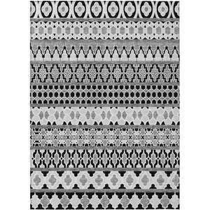 Photo of Black Gray And Ivory Quatrefoil Washable Indoor Outdoor Area Rug