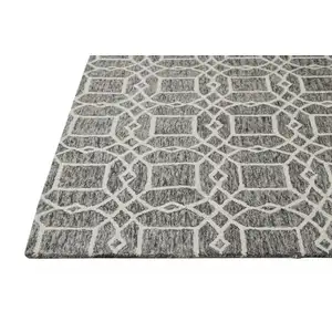 Photo of Black Gray And Ivory Wool Geometric Tufted Handmade Stain Resistant Area Rug