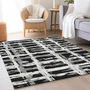 Photo of Black Gray And Silver Striped Washable Indoor Outdoor Area Rug