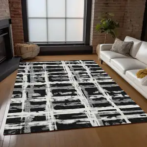 Photo of Black Gray And Silver Striped Washable Indoor Outdoor Area Rug