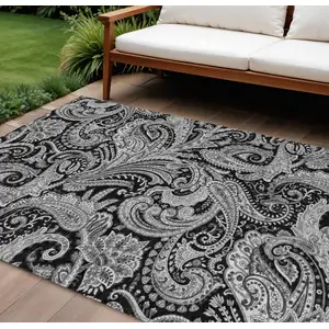 Photo of Black Gray And White Paisley Washable Indoor Outdoor Area Rug