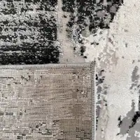 Photo of Black Gray and Beige Abstract Area Rug