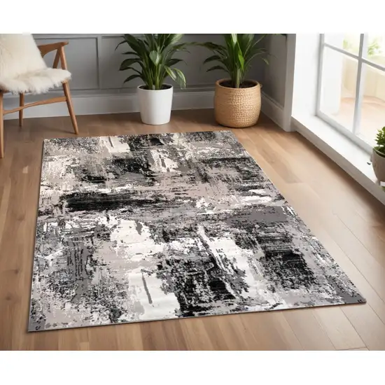 Black Gray and Beige Abstract Area Rug Photo 1