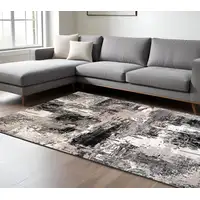 Photo of Black Gray and Beige Abstract Area Rug