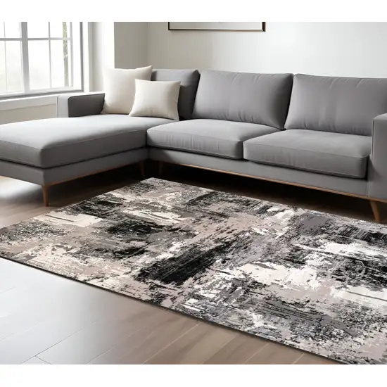 Black Gray and Beige Abstract Area Rug Photo 1