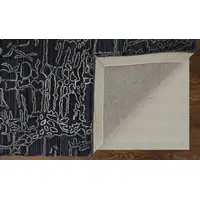 Photo of Black Gray and Ivory Abstract Hand Woven Area Rug