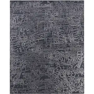 Photo of Black Gray and Ivory Abstract Hand Woven Area Rug