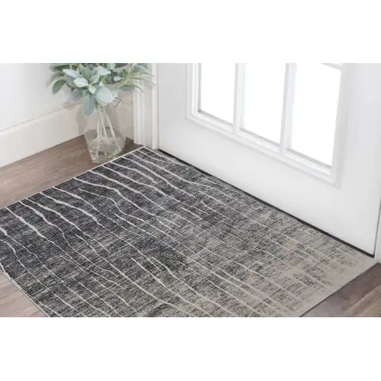 Black Gray and Ivory Abstract Power Loom Area Rug Photo 1