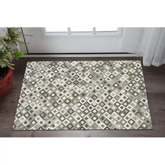 Black Gray and White Faux Cowhide Animal Print Power Loom Area Rug Photo 1