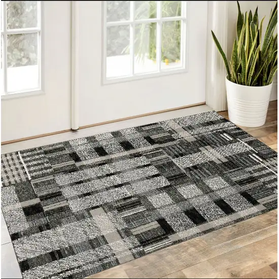 Gray and Black Geometric Power Loom Area Rug Photo 1