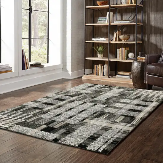 Black Grey And Ivory Geometric Power Loom Stain Resistant Area Rug Photo 8