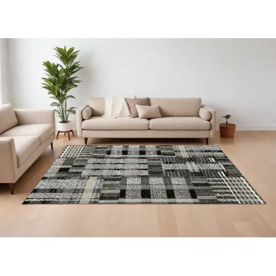 Gray and Black Geometric Power Loom Area Rug Photo 1