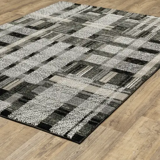 Black Grey And Ivory Geometric Power Loom Stain Resistant Area Rug Photo 6