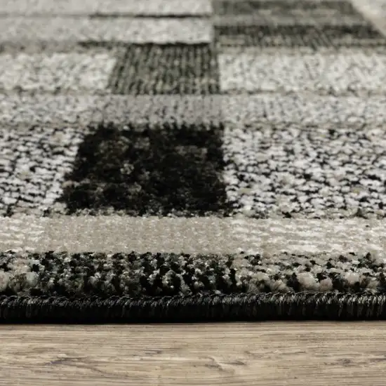 Black Grey And Ivory Geometric Power Loom Stain Resistant Area Rug Photo 5