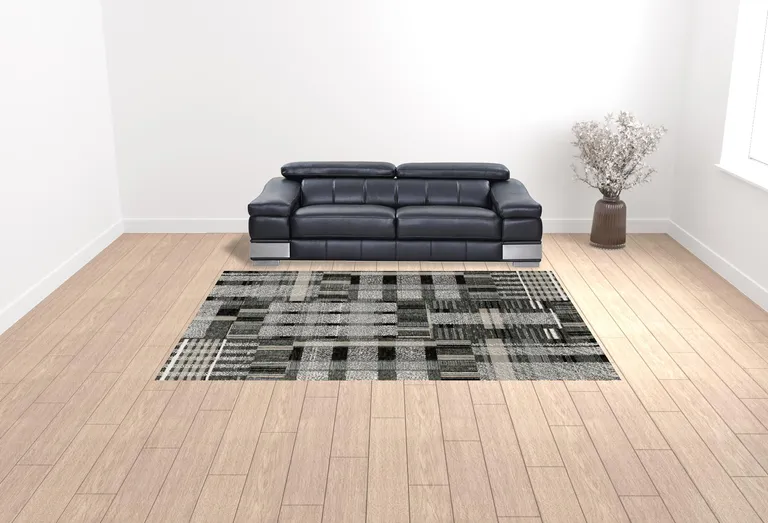 Black Grey And Ivory Geometric Power Loom Stain Resistant Area Rug Photo 2