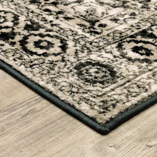 Black Grey Tan And Ivory Oriental Power Loom Stain Resistant Area Rug Photo 3