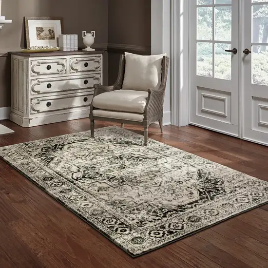 Black Grey Tan And Ivory Oriental Power Loom Stain Resistant Area Rug Photo 8