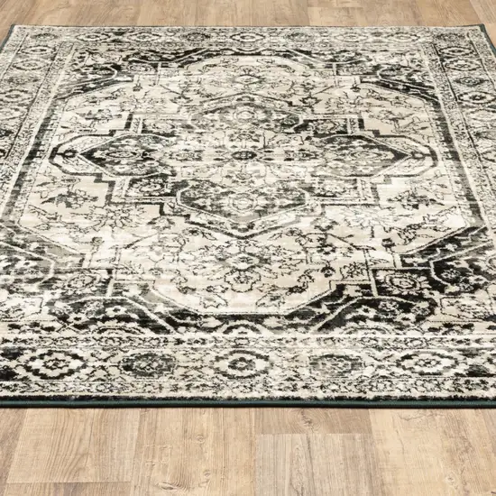 Black Grey Tan And Ivory Oriental Power Loom Stain Resistant Area Rug Photo 7