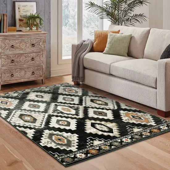 Black Grey Tan Orange And Ivory Southwestern Power Loom Stain Resistant Area Rug Photo 7