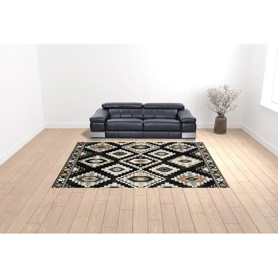 Black Grey Tan Orange And Ivory Southwestern Power Loom Stain Resistant Area Rug Photo 2