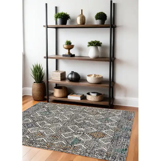 Black Ivory And Green Wool Geometric Tufted Handmade Distressed Area Rug Photo 1