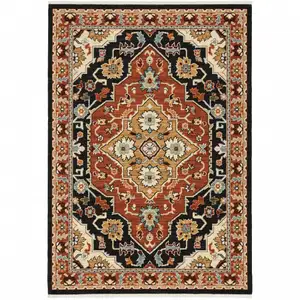 Photo of Black Orange And Beige Oriental Power Loom Stain Resistant Area Rug With Fringe