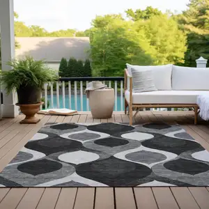 Photo of Black Silver And Charcoal Ogee Washable Indoor Outdoor Area Rug