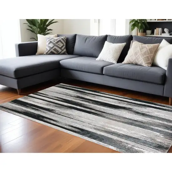 Black Silver and Gray Abstract Power Loom Area Rug Photo 1