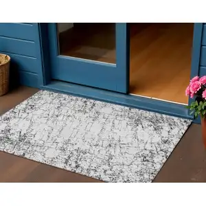 Photo of Black White And Gray Abstract Washable Indoor Outdoor Area Rug