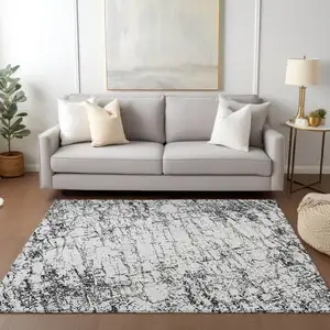 Photo of Black White And Gray Abstract Washable Indoor Outdoor Area Rug