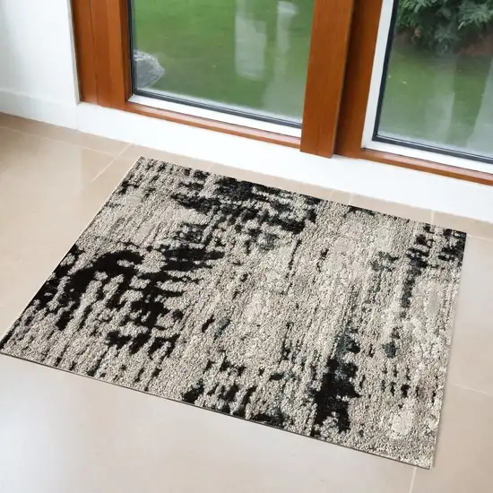 Black White And Gray Stain Resistant Area Rug Photo 1