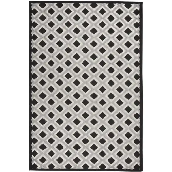 Black And White Geometric Indoor Outdoor Area Rug Photo 1