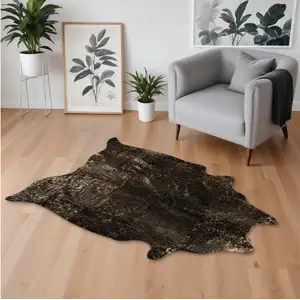 Photo of Black and Copper Gold Cowhide Hand Knotted Area Rug