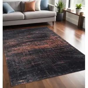 Photo of Black and Gold Abstract Non Skid Area Rug