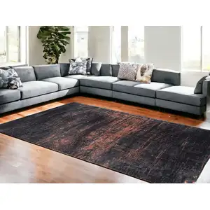 Photo of Black and Gold Abstract Non Skid Area Rug