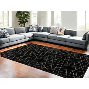 Photo of Black and Gold Faux Fur Abstract Shag Non Skid Area Rug