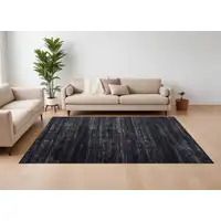 Photo of Black and Gray Power Loom Area Rug