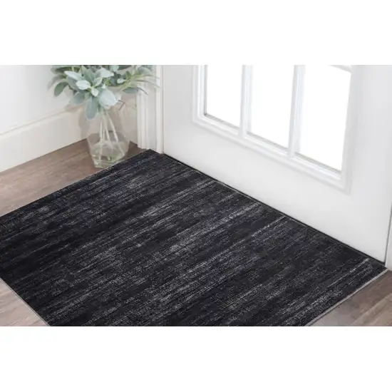 Black and Gray Power Loom Area Rug Photo 1