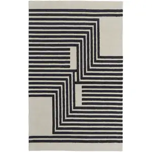 Photo of Black and Ivory Abstract Geometric Hand Tufted Area Rug