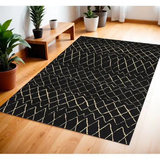 Black and Ivory Abstract Power Loom Distressed Area Rug Photo 1