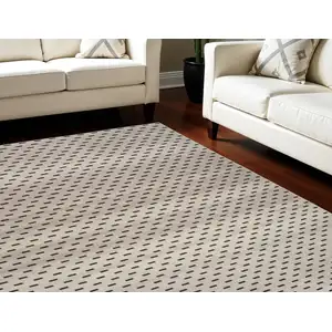 Photo of Black and Ivory Abstract Power Loom Washable Non Skid Area Rug