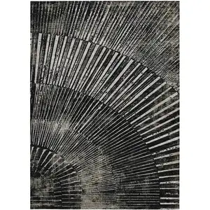 Photo of Black and Ivory Abstract Washable Non Skid Indoor Outdoor Area Rug