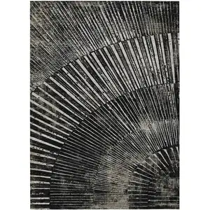 Photo of Black and Ivory Abstract Washable Non Skid Indoor Outdoor Area Rug