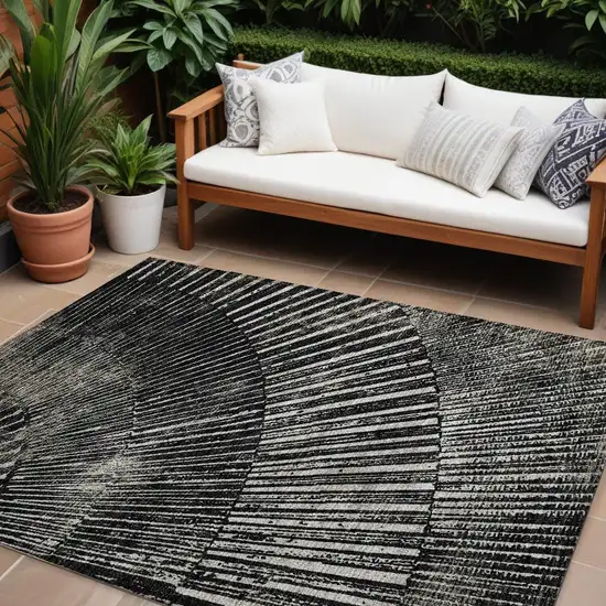 Black and Ivory Abstract Washable Non Skid Indoor Outdoor Area Rug Photo 1