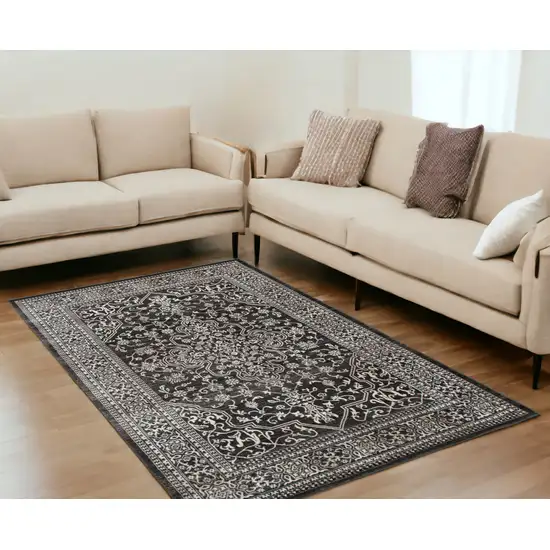 Black and Ivory Oriental Distressed Area Rug Photo 1