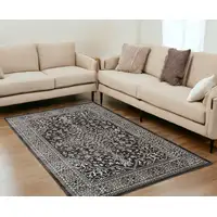 Photo of Black and Ivory Oriental Distressed Area Rug