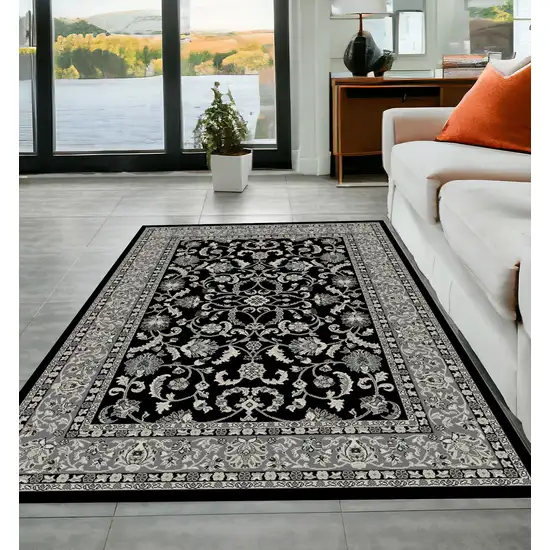 Black and Ivory Oriental Distressed Area Rug Photo 1