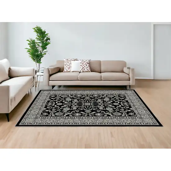 Black and Ivory Oriental Distressed Area Rug Photo 1